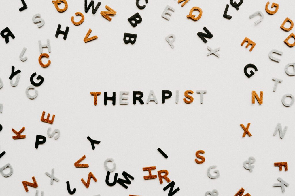 Therapist insurance concept image with the word therapist surrounded by letters, representing malpractice insurance for therapists and professional liability coverage.